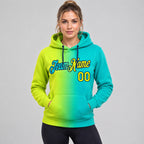Custom Aqua Gradient Pullover Hoodie with Neon Yellow and Navy Lettering worn by female model