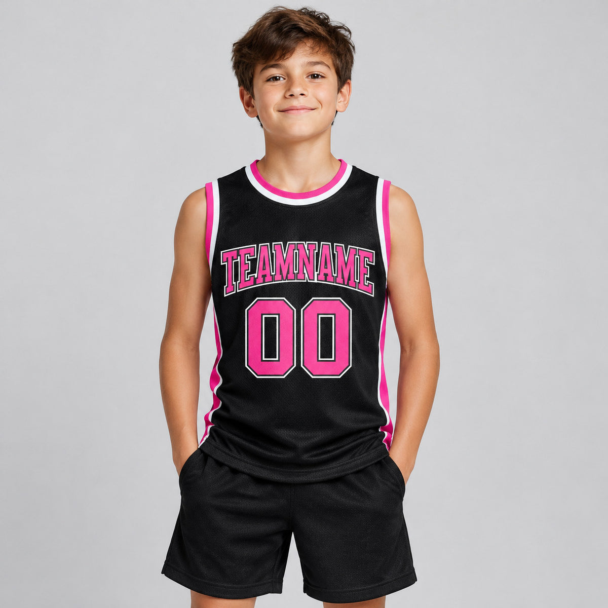 Custom Black Authentic Throwback Basketball Jersey with Pink and White Lettering youth size worn by child model