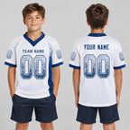 Custom White Drift Football Jersey with Royal Lettering youth size worn by child model