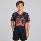 Custom Navy Drift Football Jersey with Orange and White Lettering Design 0127 youth size worn by child model