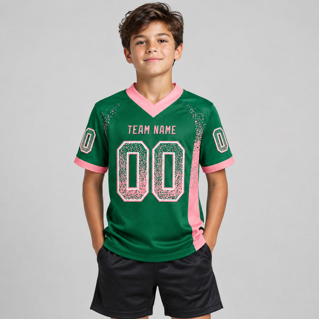 Custom Kelly Green Drift Football Jersey with Medium Pink and White Lettering youth size worn by child model