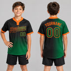Custom Black Gradient Two Button Softball Jersey with Kelly Green and Orange Lettering youth size worn by child model