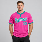 Custom Pink Two Button Softball Jersey with Teal and White Lettering worn by male model