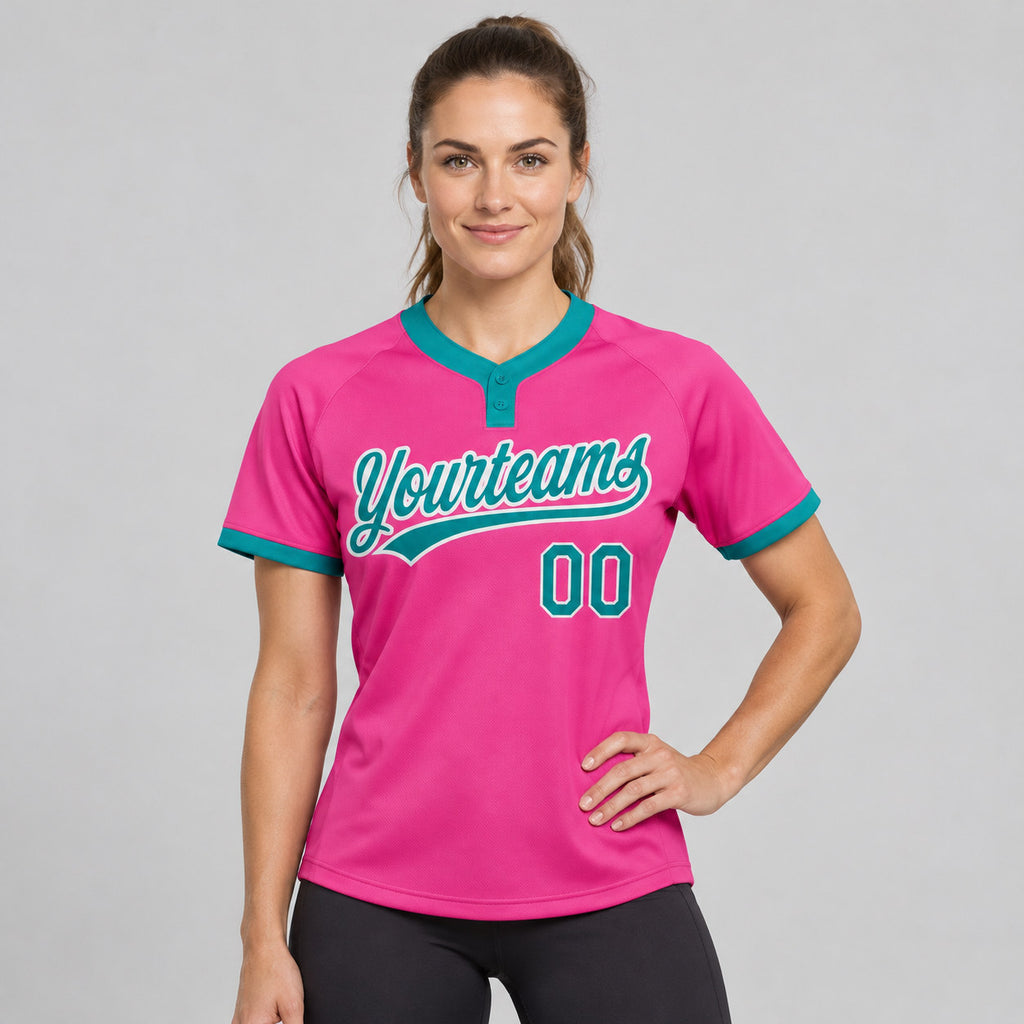 Custom Pink Two Button Softball Jersey with Teal and White Lettering worn by female model