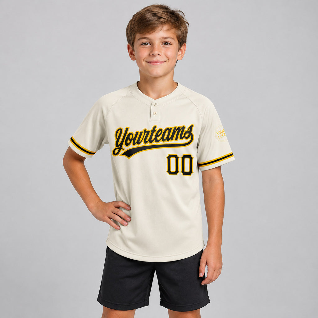 Custom Cream Two Button Softball Jersey with Black and Yellow Lettering youth size worn by child model