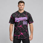 Custom Black Abstract Network Two Button Softball Jersey with Light Blue and Pink Lettering worn by male model