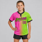 Custom Neon Green Gradient Two Button Softball Jersey with Pink and Black Lettering youth size worn by child model