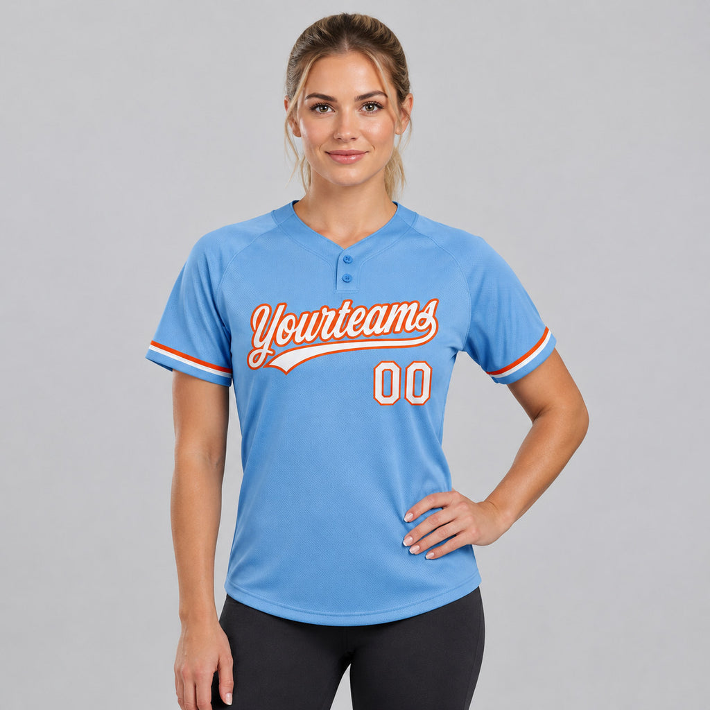 Custom Light Blue Two Button Softball Jersey with White and Orange Lettering worn by female model