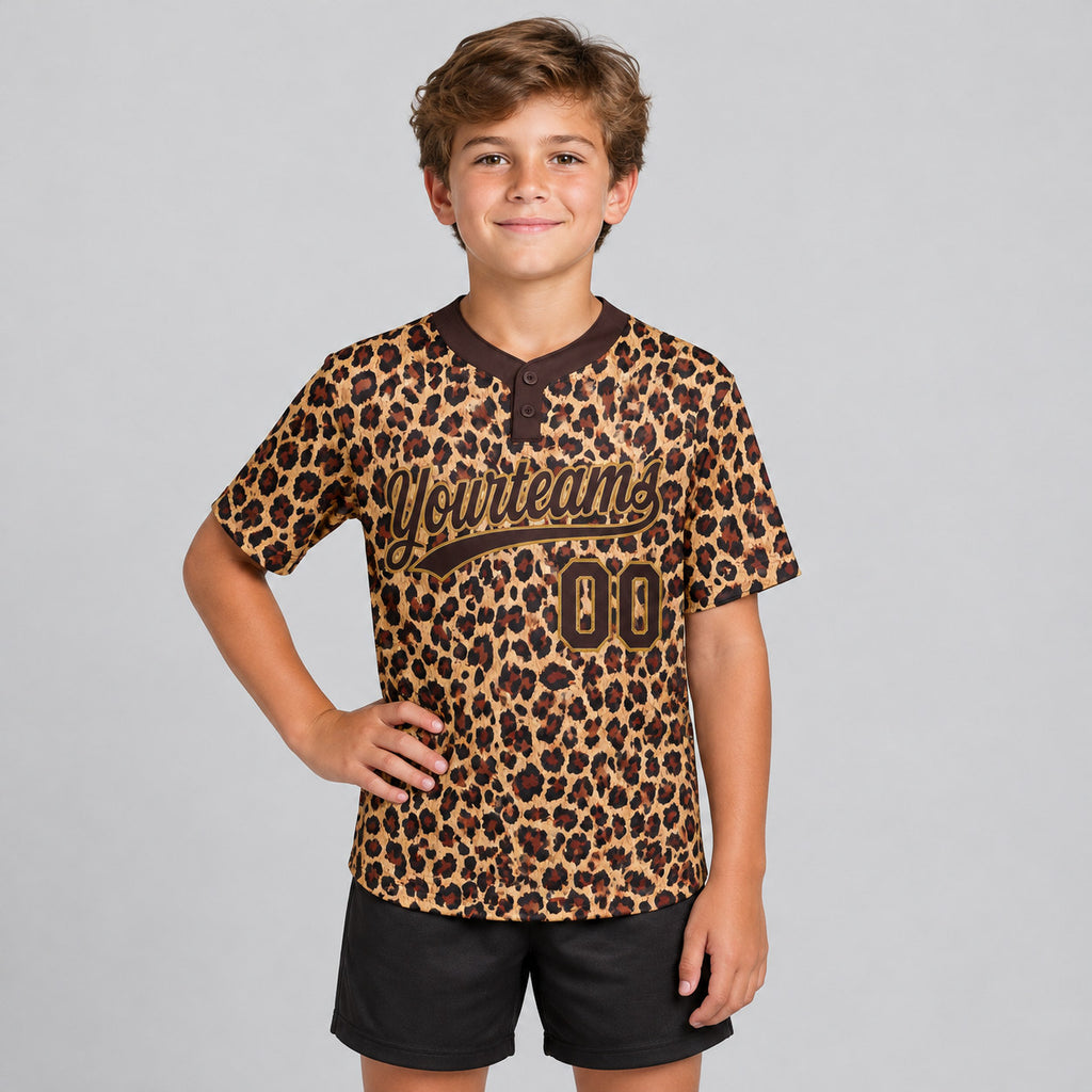 Custom Brown Leopard Two Button Softball Jersey with Brown and Old Gold Lettering youth size worn by child model