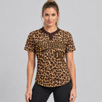 Custom Brown Leopard Two Button Softball Jersey with Brown and Old Gold Lettering worn by female model