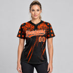 Custom Black Distressed Scratch Raglan Sleeves Two Button Softball Jersey with Orange and White Lettering worn by female model