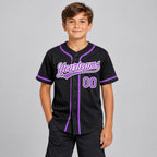 Custom Black Button Down Reversible Baseball Jersey with Medium Purple and White Lettering youth size worn by child model