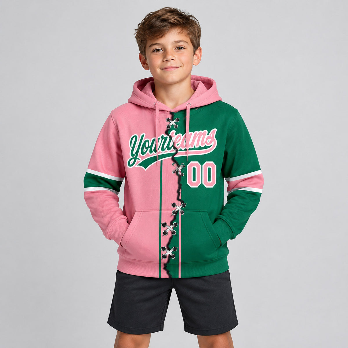 Custom Kelly Green Ripped Split Baseball Pullover Hoodie with Medium Pink and White Lettering youth size worn by child model