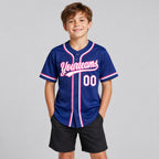 Custom Royal Button Down Reversible Baseball Jersey with White and Pink Lettering youth size worn by child model