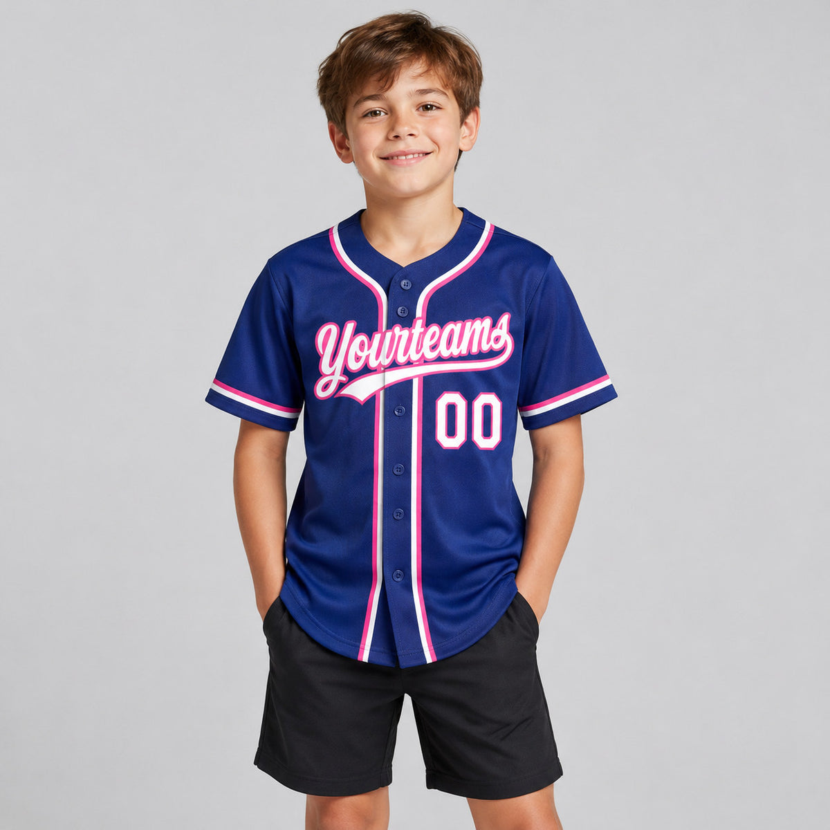 Custom Royal Button Down Reversible Baseball Jersey with White and Pink Lettering youth size worn by child model