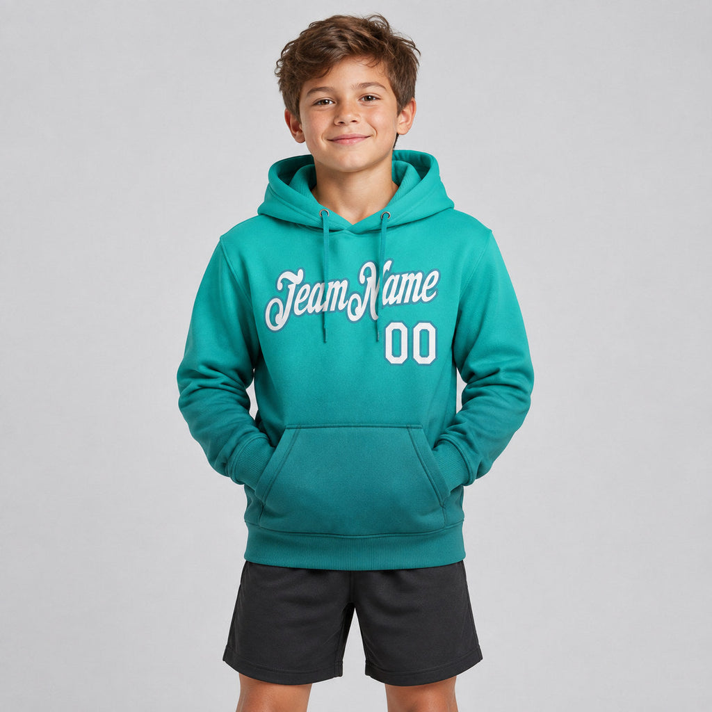 Custom Aqua Fade Pullover Hoodie with White and Teal Lettering youth size worn by child model