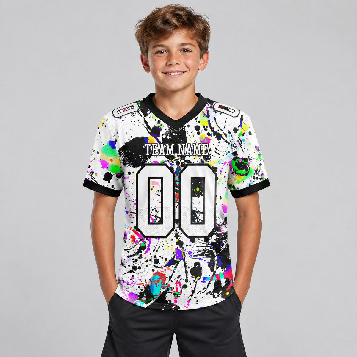 Custom White and Black Graffiti Splash Authentic Football Jersey youth size worn by child model