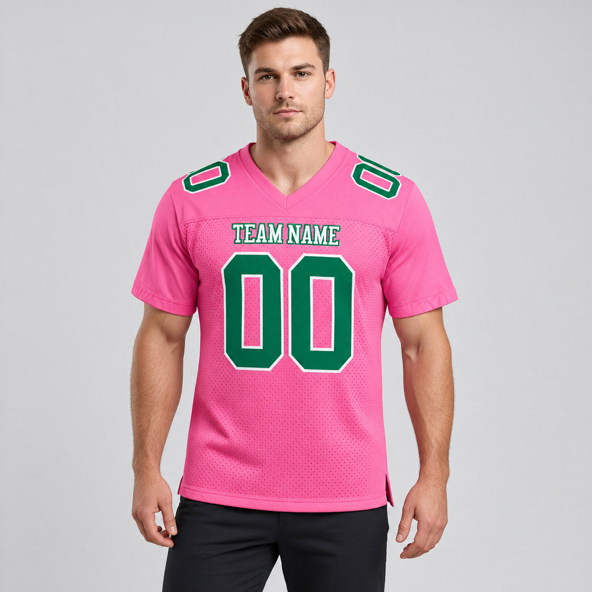Custom Pink Mesh Authentic Football Jersey with Kelly Green and White Lettering Design 0174 worn by male model
