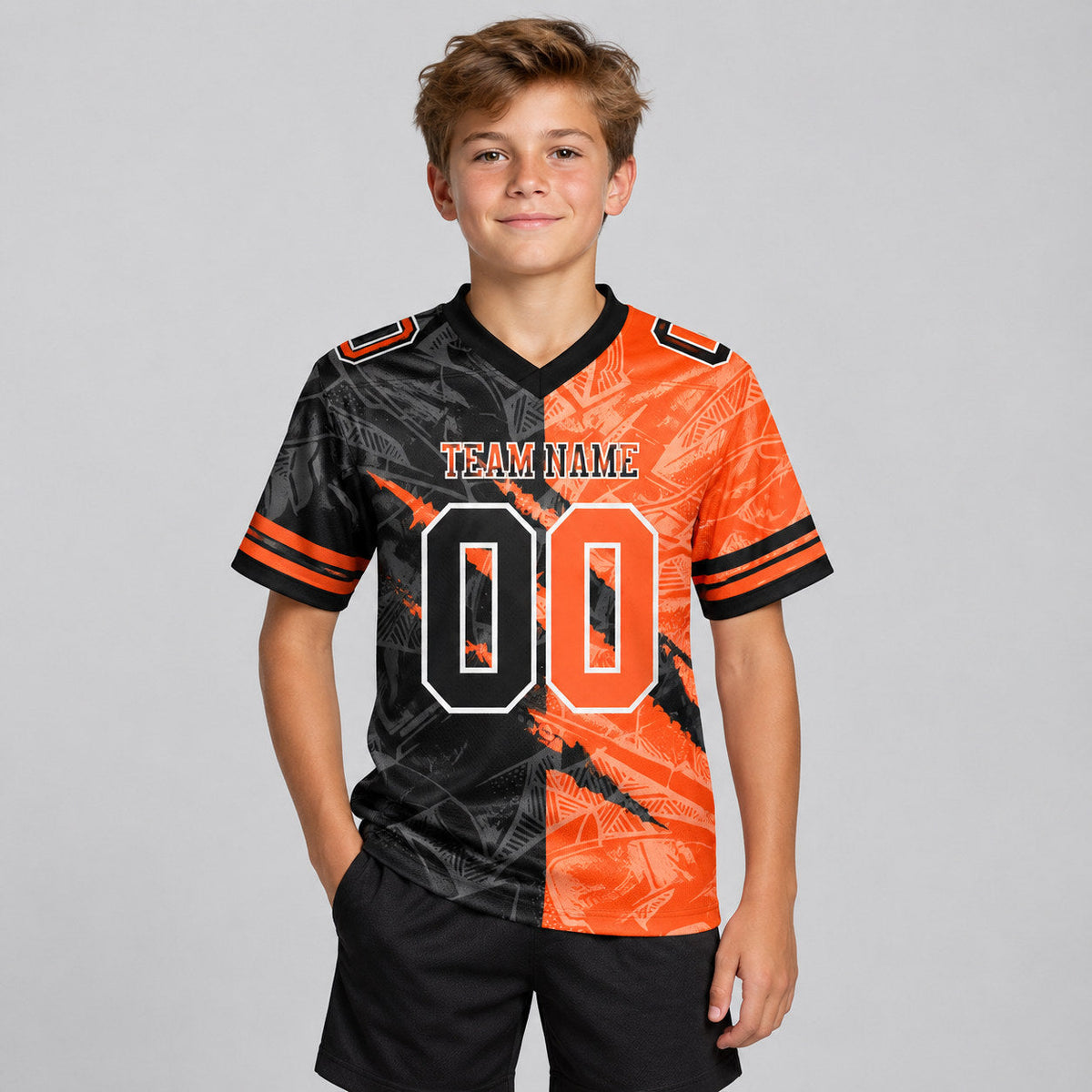 Custom Black Gradient Scratch Authentic Football Jersey with Orange and White Lettering youth size worn by child model