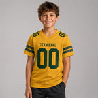 Custom Old Gold Mesh Authentic Football Jersey with Green Lettering youth size worn by child model