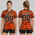 Custom Orange Tiger Print Authentic Football Jersey with Black and Cream Lettering worn by female model
