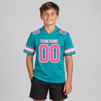 Custom Aqua Mesh Authentic Football Jersey with Pink and White Lettering Design 0141 youth size worn by child model