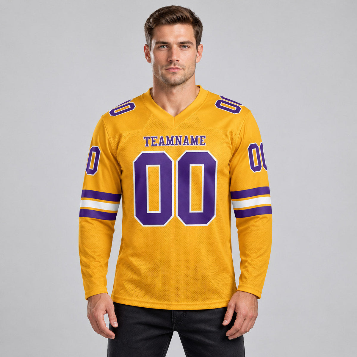 Custom Old Gold Long Sleeve Authentic Football Jersey with Purple and White Lettering worn by male model