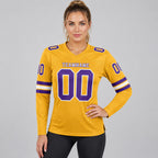 Custom Old Gold Long Sleeve Authentic Football Jersey with Purple and White Lettering worn by female model