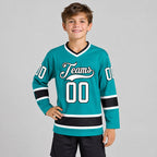 Custom Aqua Hockey Jersey with White and Black Lettering youth size worn by child model