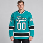 Custom Aqua Hockey Jersey with White and Black Lettering worn by male model