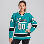 Custom Aqua Hockey Jersey with White and Black Lettering worn by female model