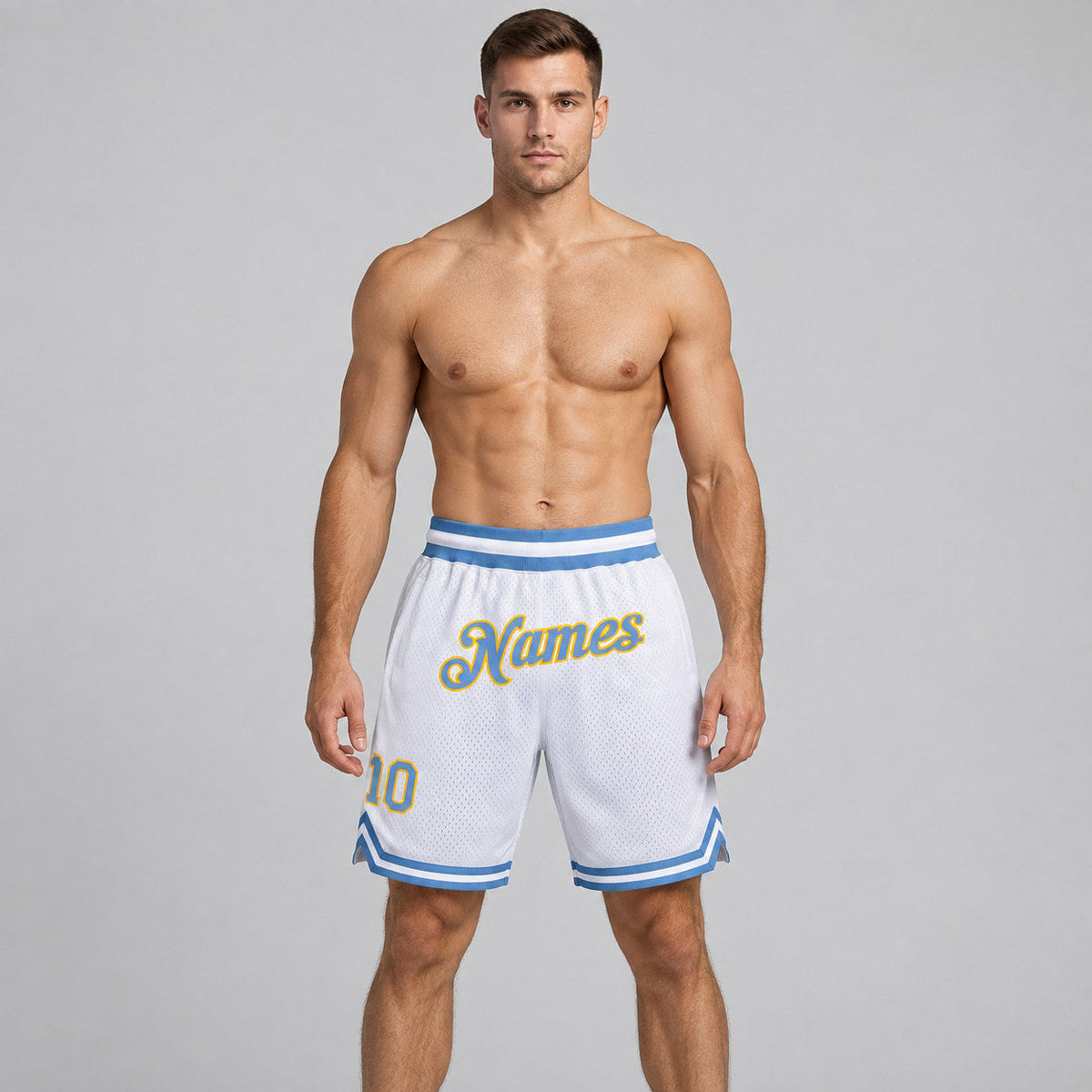 Custom White Authentic Throwback Basketball Shorts with Light Blue and Gold Lettering worn by male model
