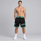 Custom Black Authentic Throwback Basketball Shorts with Kelly Green and White Lettering Design 0255 worn by male model