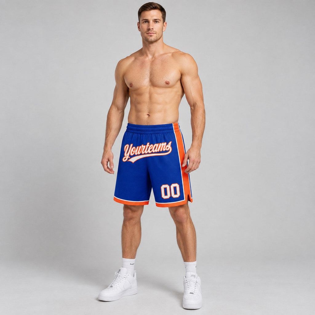 Custom Royal Authentic Basketball Shorts with White and Orange Lettering worn by male model