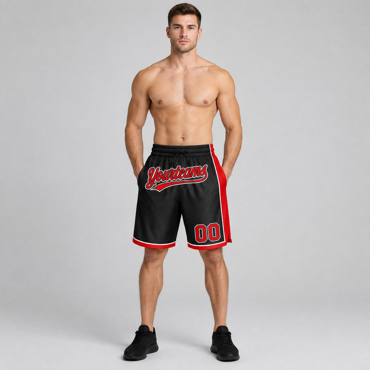 Custom Black Authentic Basketball Shorts with Red and White Lettering worn by male model
