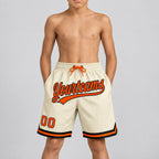 Custom Cream Authentic Throwback Basketball Shorts with Orange and Black Lettering Design 0450 youth size worn by child model
