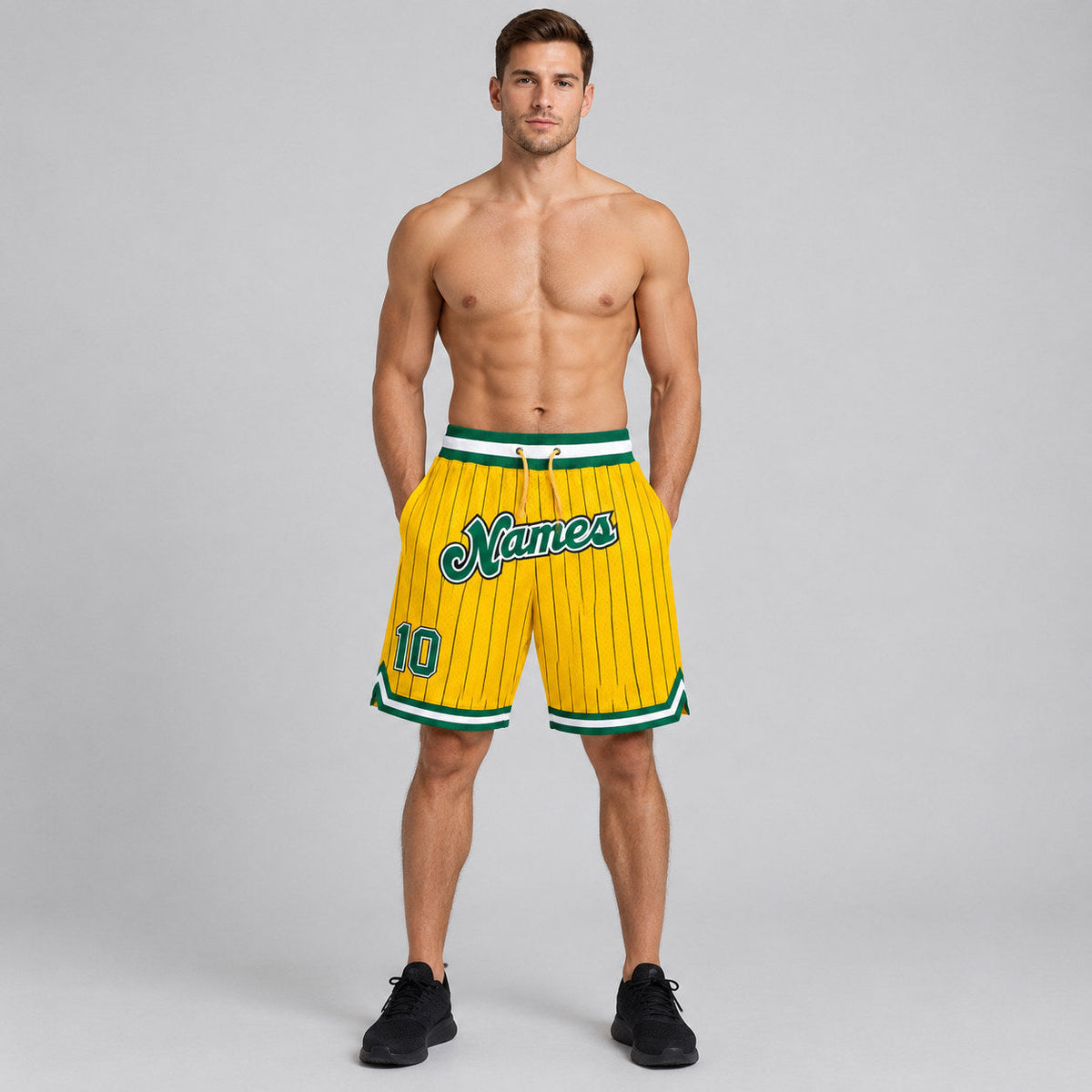 Custom Gold and Black Pinstripe Authentic Basketball Shorts with Kelly Green and White Lettering worn by male model