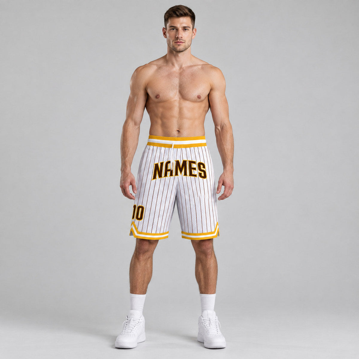 Custom White and Brown Pinstripe Authentic Basketball Shorts with Brown and Gold Lettering worn by male model