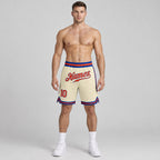 Custom Cream Authentic Throwback Basketball Shorts with Orange and Royal Lettering Design 0084 worn by male model