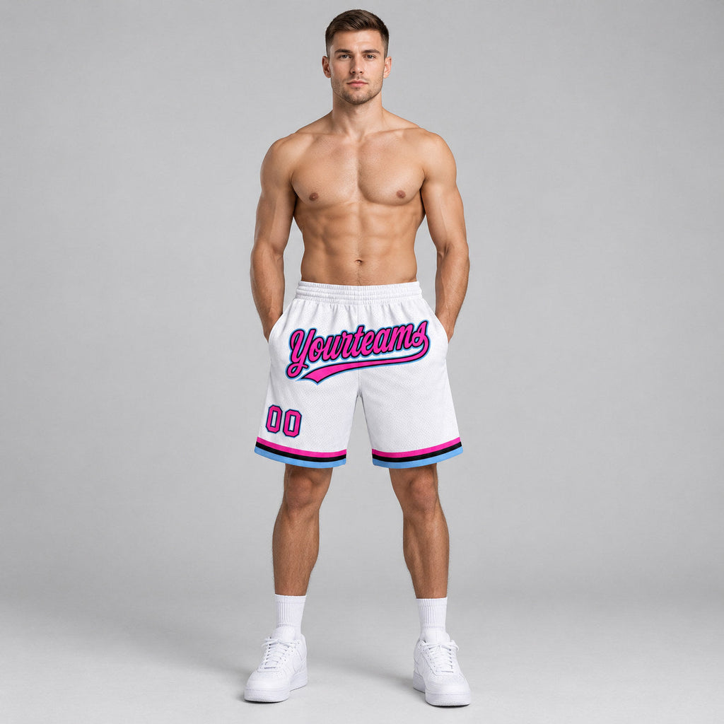Custom White and Pink Authentic Throwback Basketball Shorts with Black and Light Blue Lettering worn by male model
