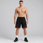 Custom Black Authentic Throwback Basketball Shorts with Red Lettering worn by male model