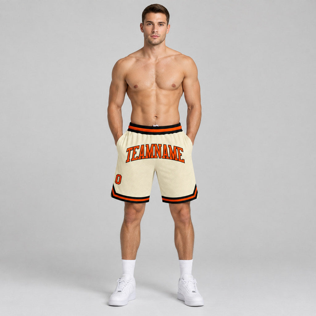 Custom Cream Authentic Throwback Basketball Shorts with Orange and Black Lettering Design 0365 worn by male model