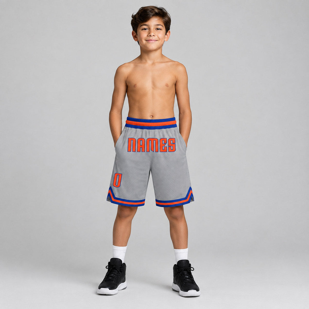 Custom Gray Authentic Throwback Basketball Shorts with Orange and Royal Lettering youth size worn by child model
