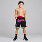 Custom Black Authentic Throwback Basketball Shorts with Red and Royal Lettering youth size worn by child model