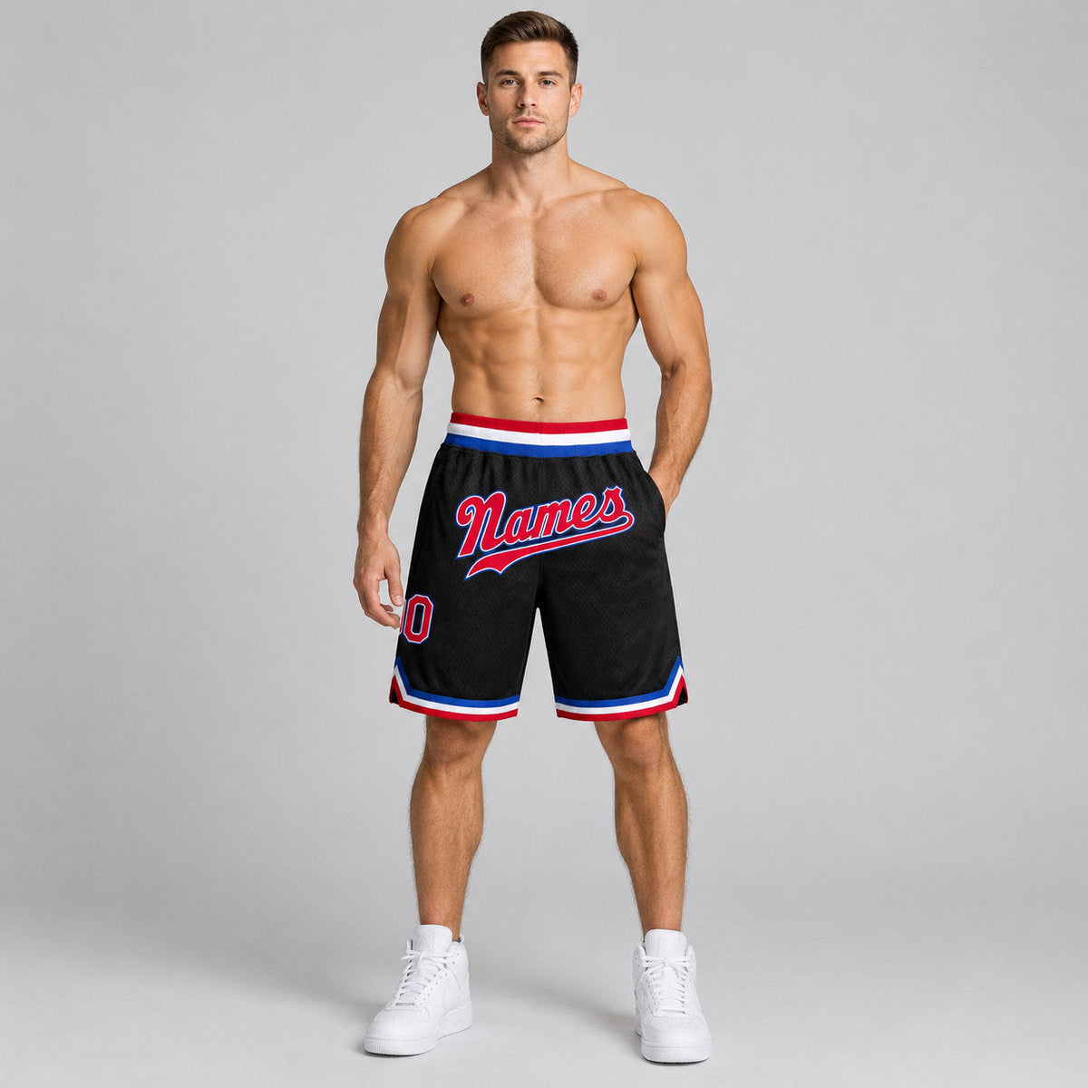 Custom Black Authentic Throwback Basketball Shorts with Red and Royal Lettering worn by male model