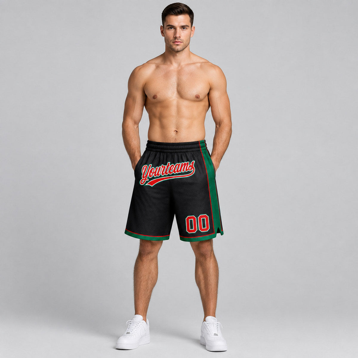 Custom Black Authentic Basketball Shorts with Red and Kelly Green Lettering worn by male model