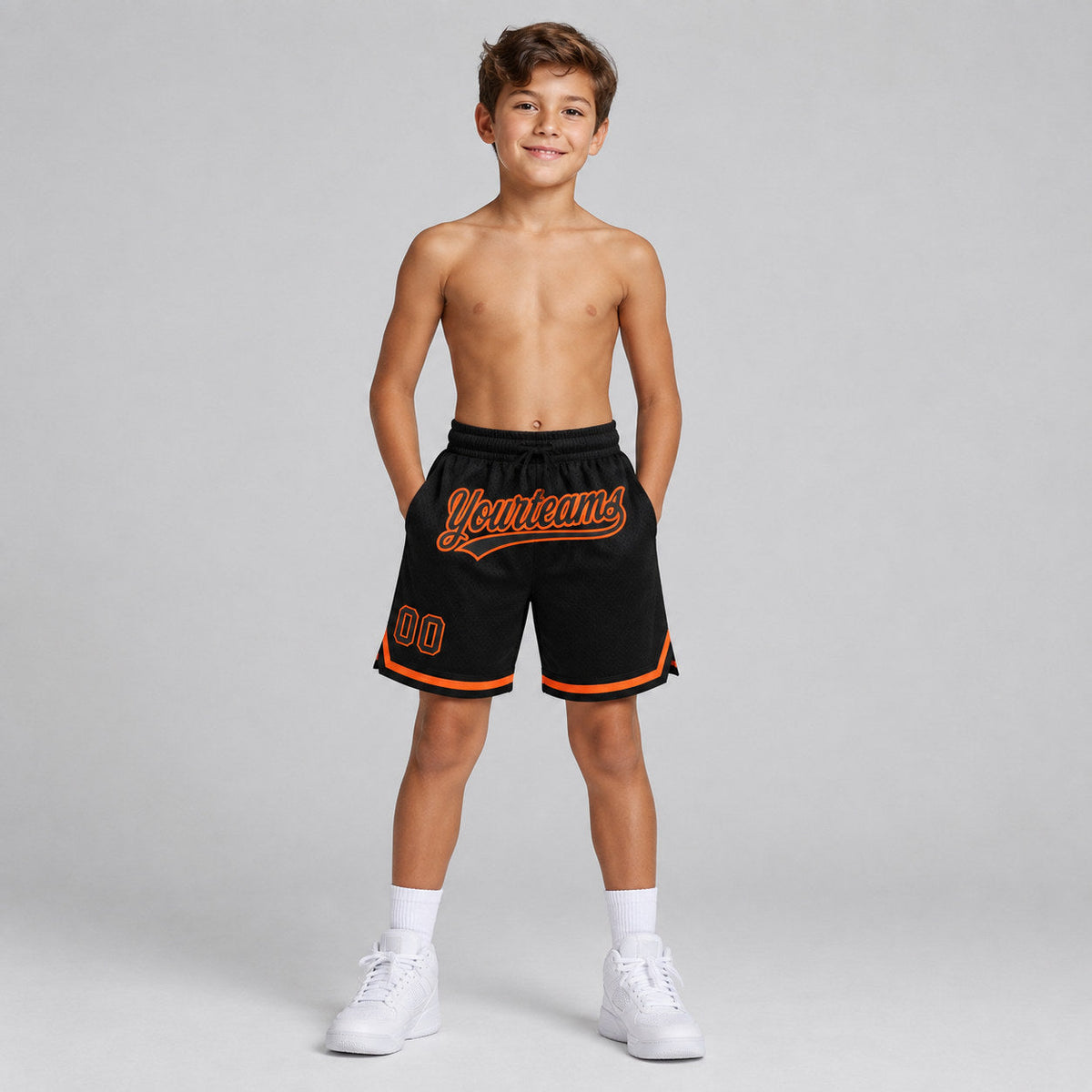 Custom Black Authentic Throwback Basketball Shorts with Orange Lettering Design 1404 youth size worn by child model