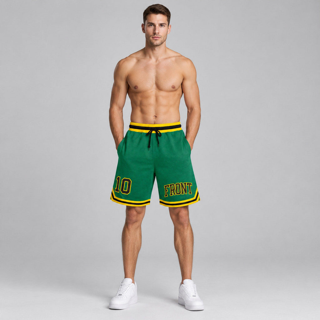 Custom Kelly Green Authentic Throwback Basketball Shorts with Black and Gold Lettering worn by male model