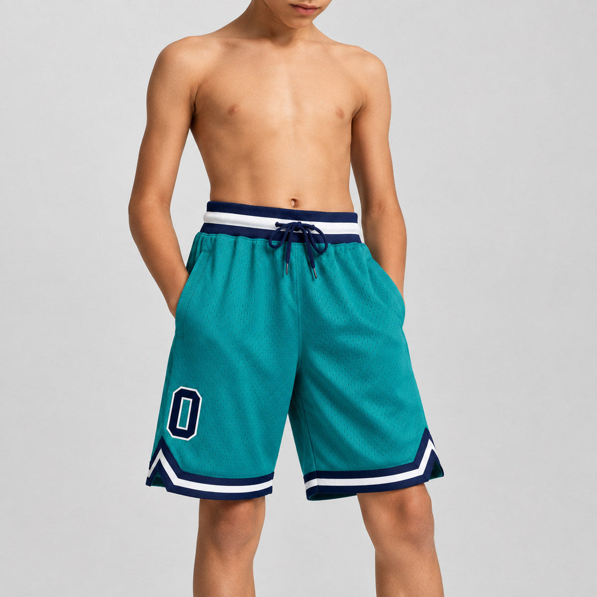 Custom Teal Authentic Throwback Basketball Shorts with Navy and White Lettering youth size worn by child model