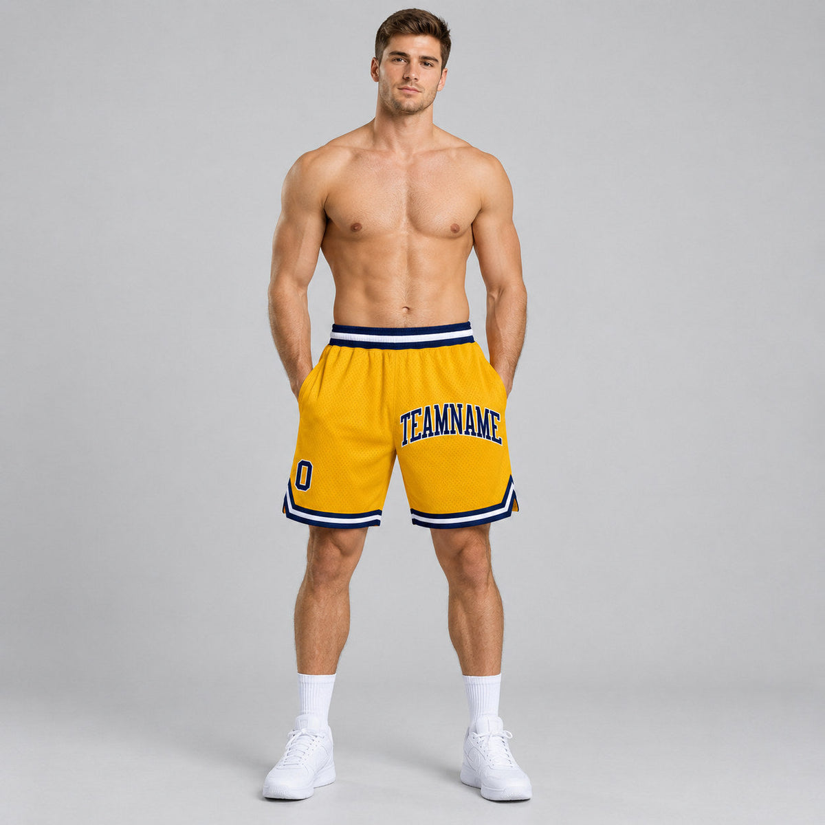 Custom Gold Authentic Throwback Basketball Shorts with Navy and White Lettering worn by male model